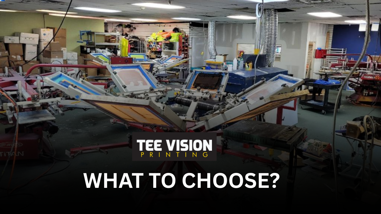 Embroidery vs. Screen Printing decision-making visual—professional screen printing workshop setup at Tee Vision Printing, highlighting multi-color apparel production.