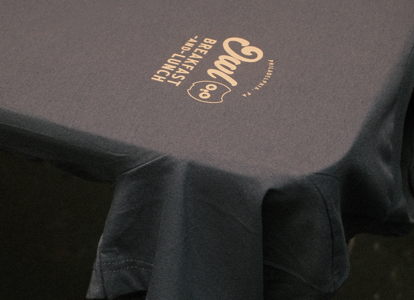 Alternative branded apparel design connected to Rob Kang Owl Breakfast, featuring an owl logo and vintage breakfast theme.