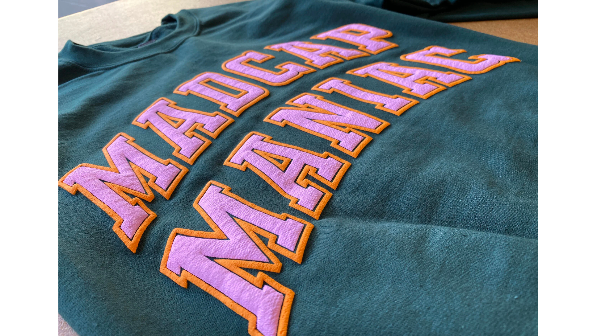 Close-up of puff print texture showing 3D raised design effect